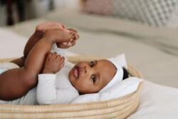 Natural Baby Changing Basket with quilted cotton changing mat