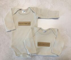 Leather tag onesie